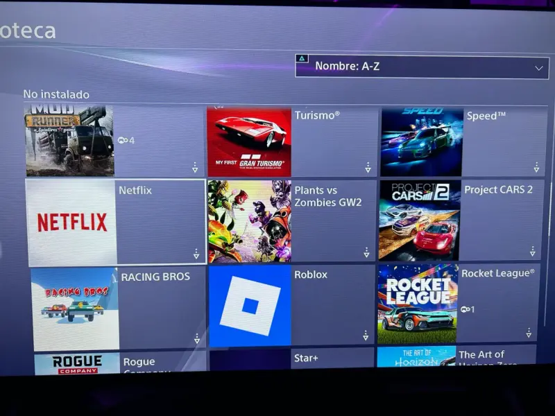 Consola PS4 con volante y juegos - 5