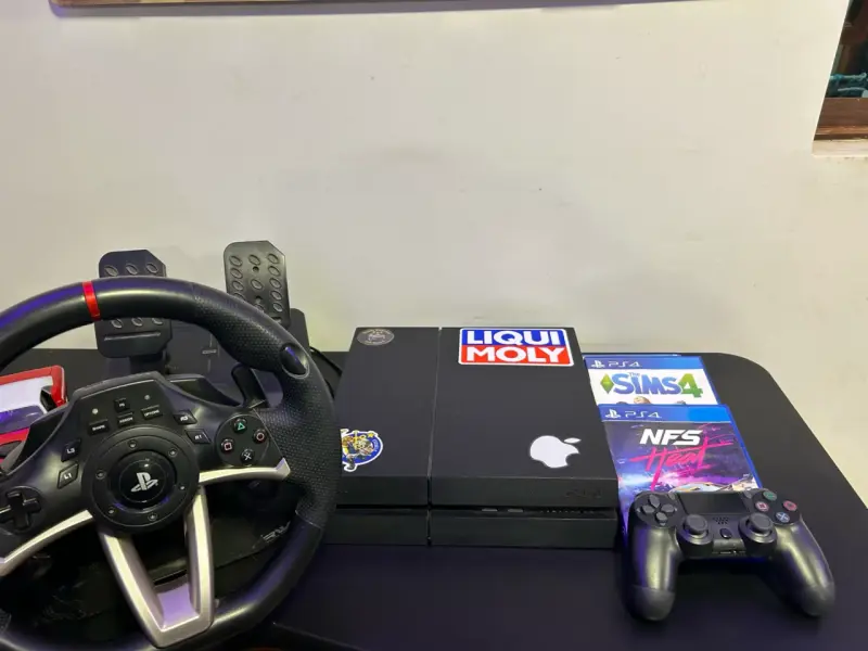 Consola PS4 con volante y juegos - 6