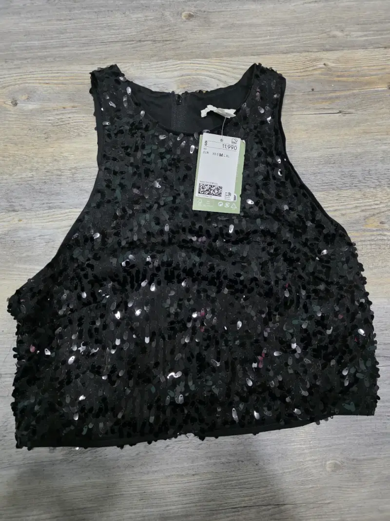 Top negro con lentejuelas - 1