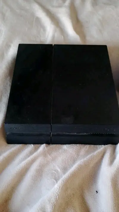 Playstation 4 con sus juegos - miniatura 1