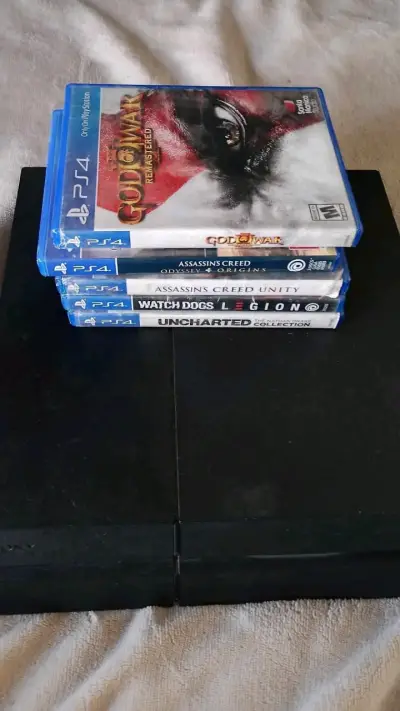 Playstation 4 con sus juegos - miniatura 2