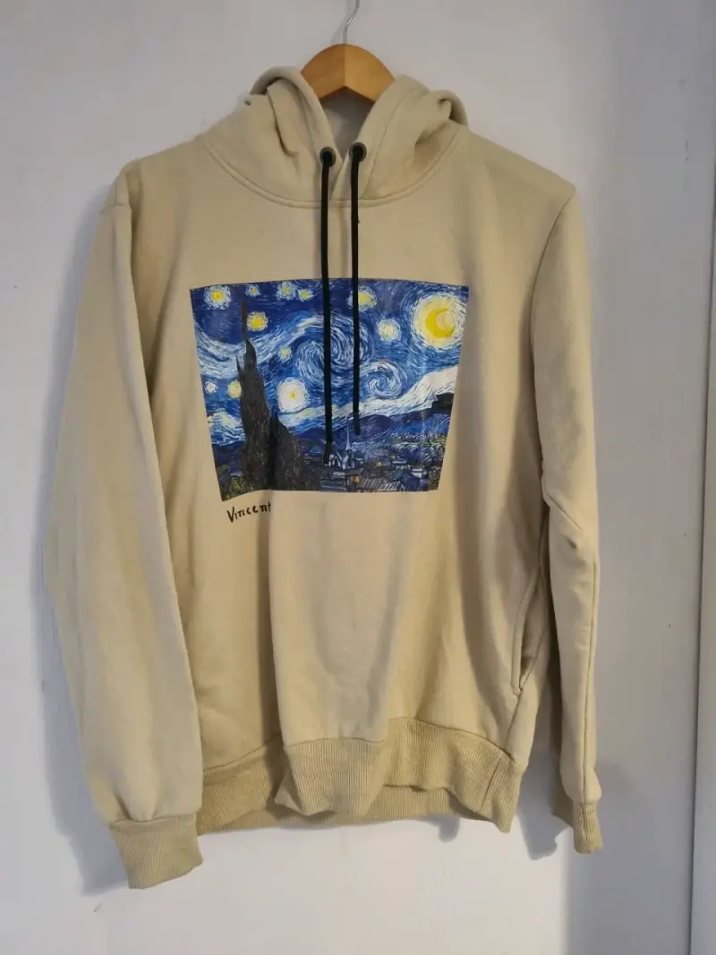 Polerón beige con impresión arte