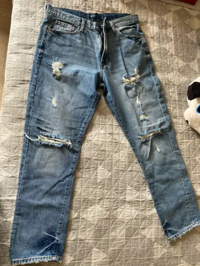 Jeans rasgados azules unisex - miniatura 1
