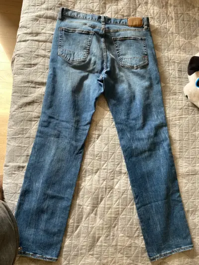 Jeans rasgados azules unisex - miniatura 4