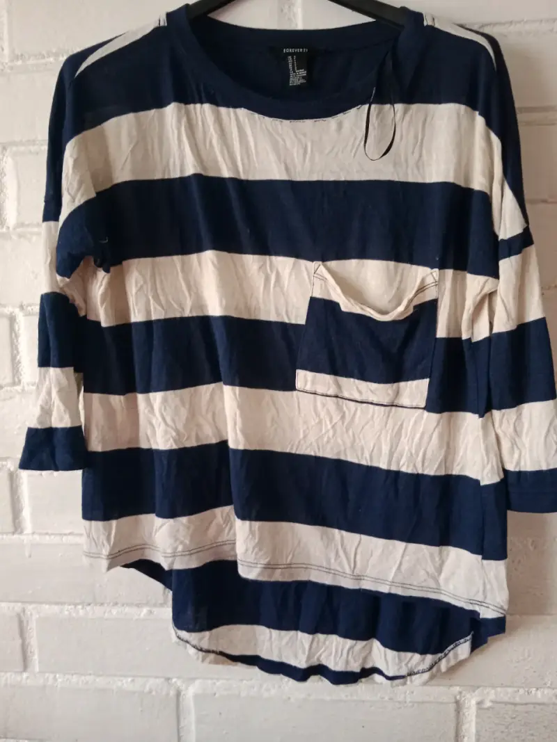 Lote de poleras y blusas variadas - 4