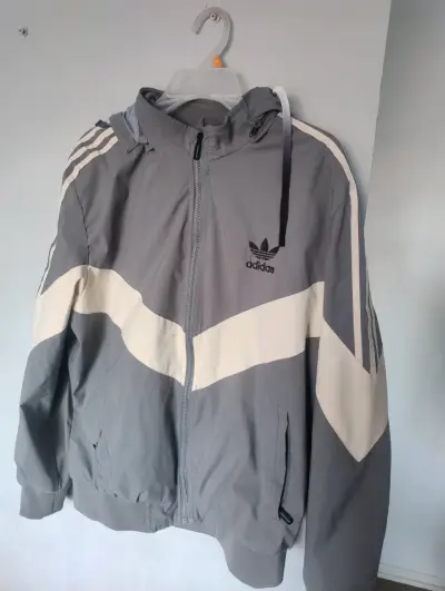 Cortaviento gris con capucha Adidas - miniatura 1