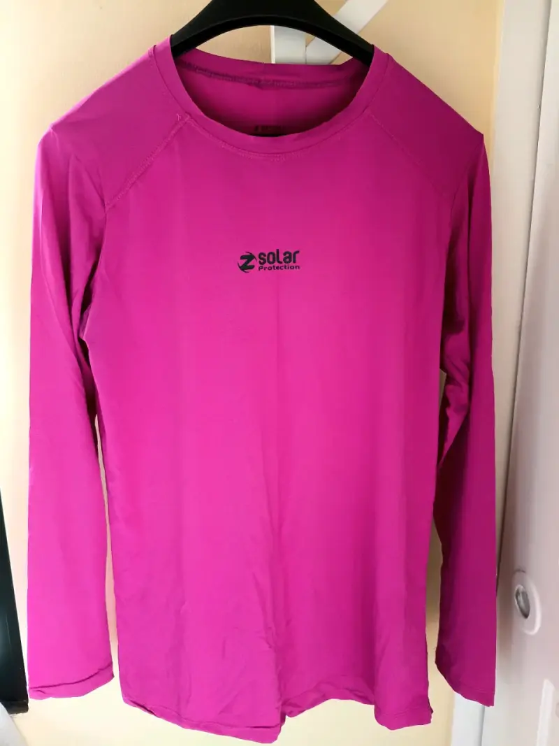 Polera deportiva solar fucsia