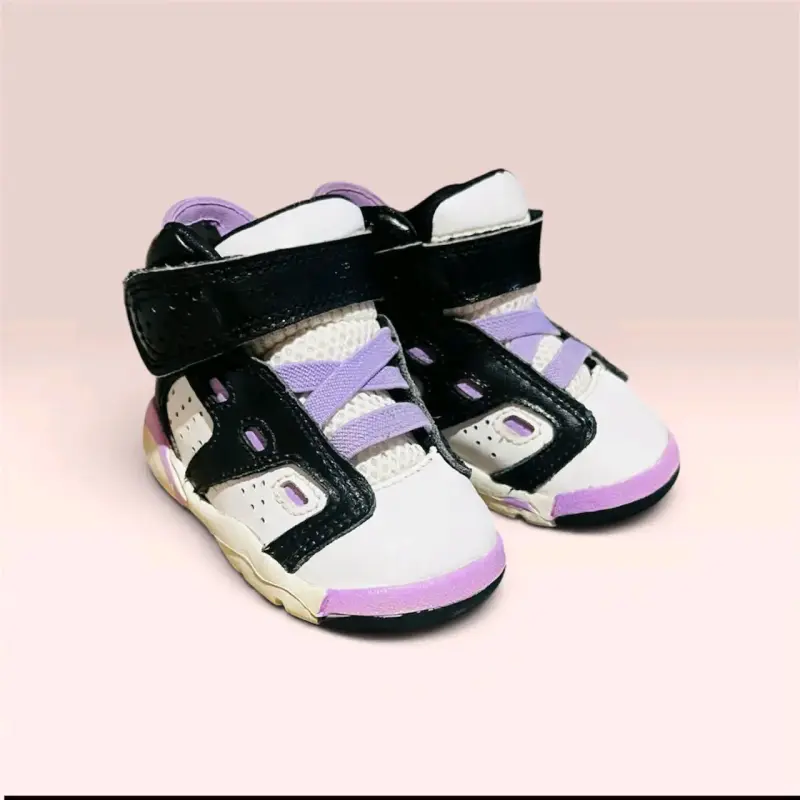 Zapatillas infantiles moradas y negras - 1