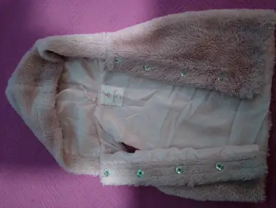 Chaleco rosado de niña con capucha - miniatura 1