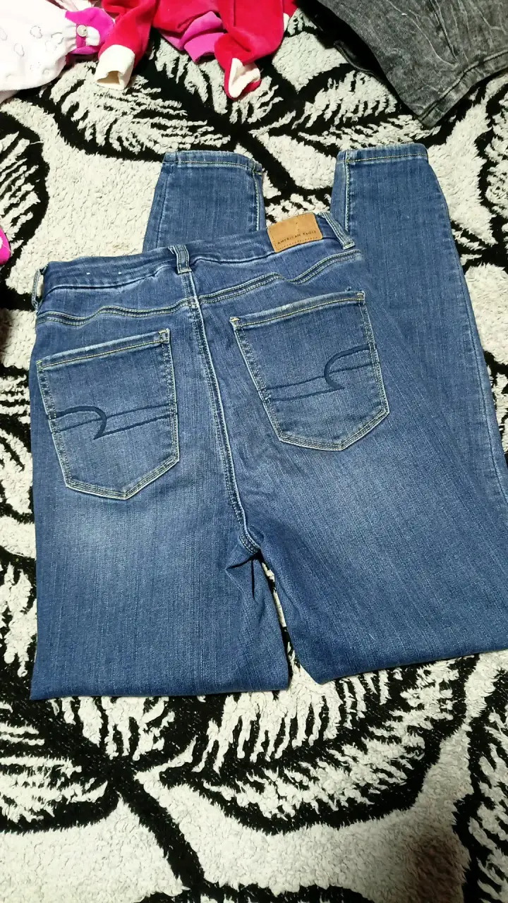Jeans azul rasgados de mujer - 2