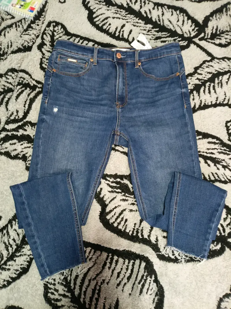 Jeans azul rasgados de mujer - 6