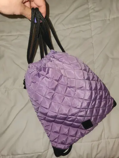 Mochila saco morada - miniatura 1