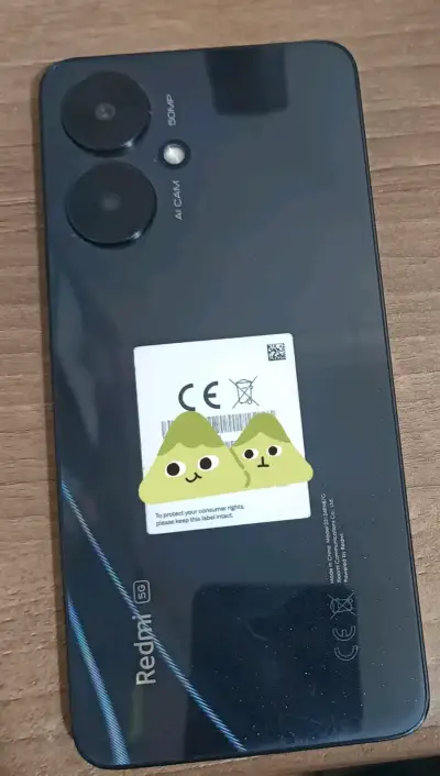 Celular plegable gris - miniatura 2