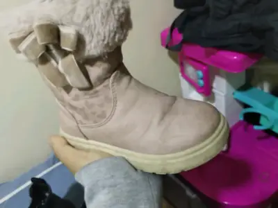 Botas de invierno con lazo rosado - miniatura 1