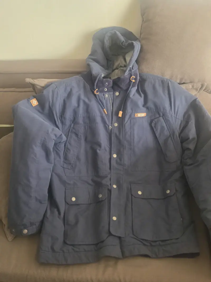 Chaqueta azul con capucha - 1