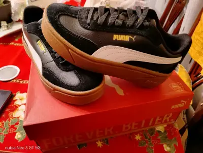 Zapatillas Puma negras y blancas - miniatura 3