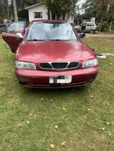 Auto daewoo nubiera rojo usado - miniatura 1