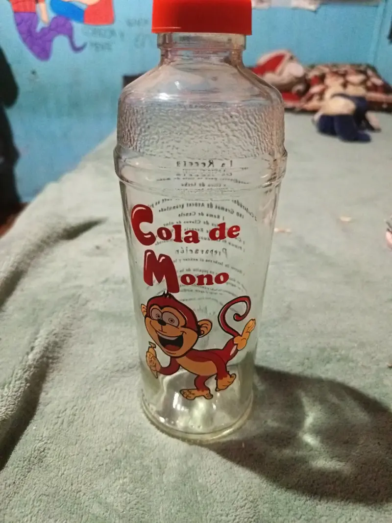 Botella vacía Cola de Mono