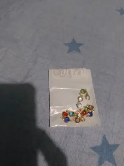 Anillo dorado en empaque - miniatura 5