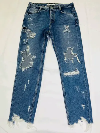 Jeans azules rotos - miniatura 1