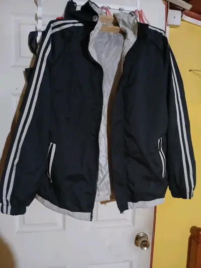 Chaqueta deportiva negra con rayas - miniatura 1