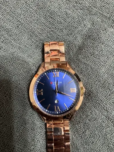 Reloj elegante dorado y azul - miniatura 2