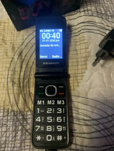 Teléfono celular plegable rojo - miniatura 2