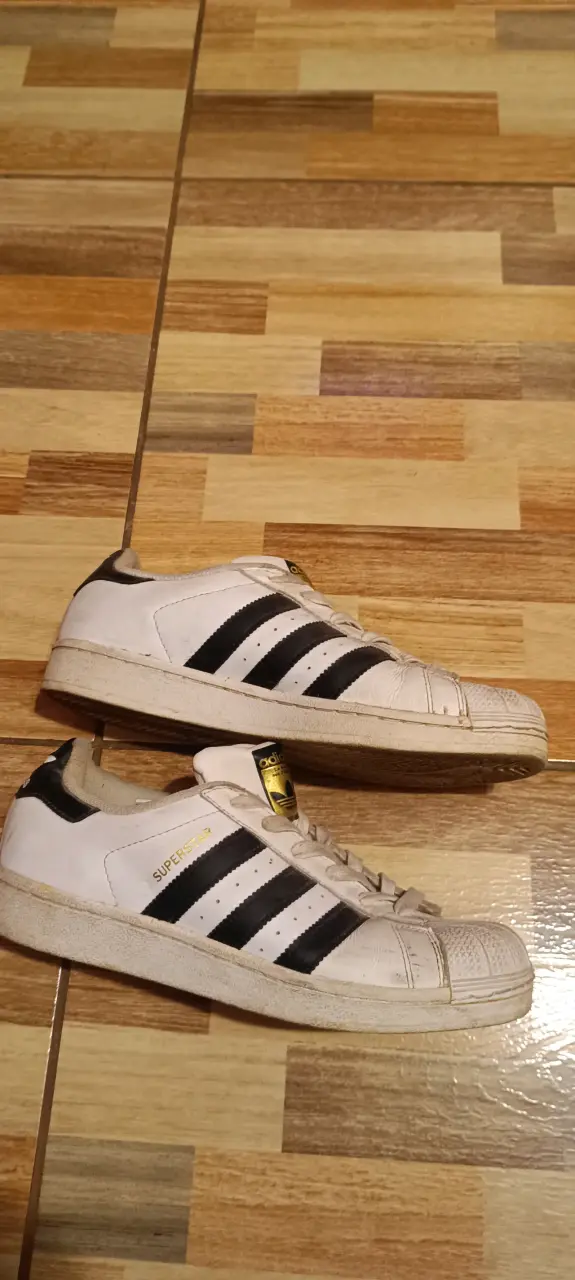Zapatillas blancas con franjas negras - 2