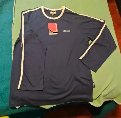 Polera Ellesse azul con bordes blancos - miniatura 1