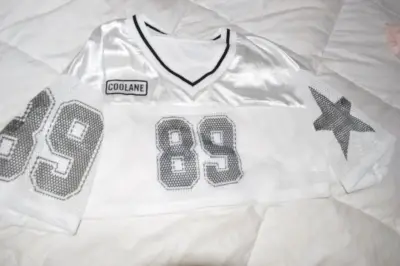 Polera top deportiva blanca con número 89 - miniatura 1