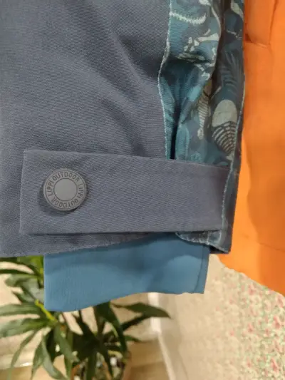Chaqueta impermeable azul y naranja - miniatura 4