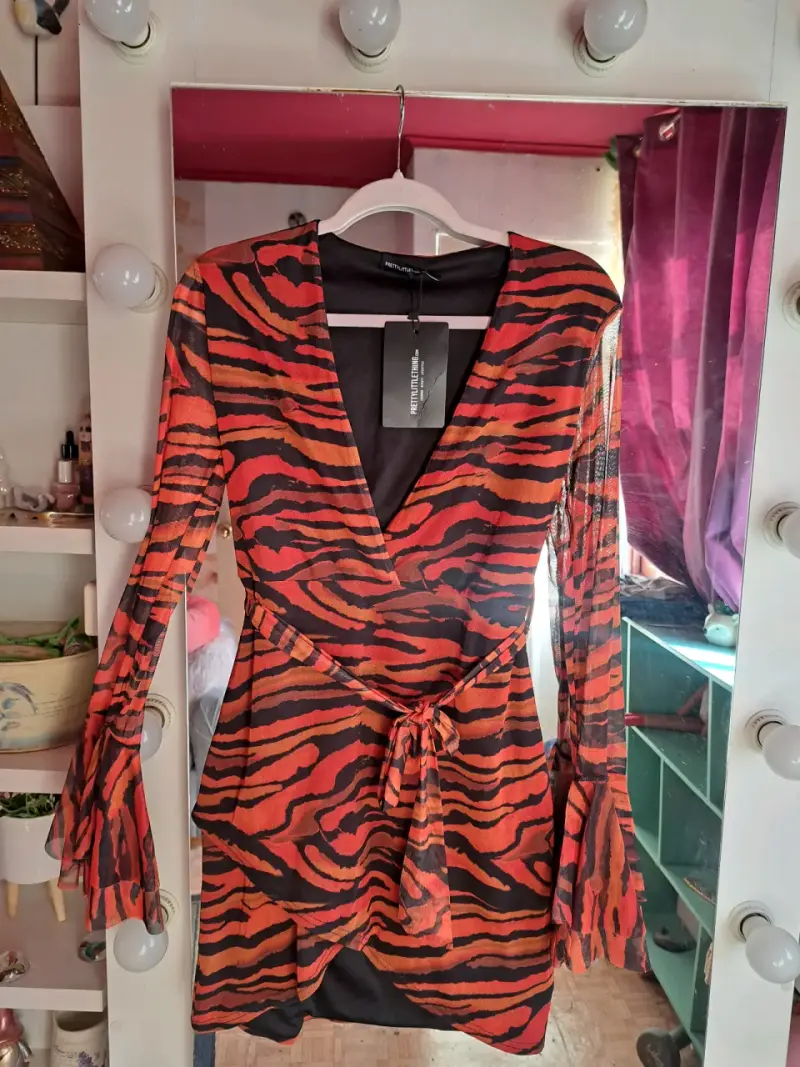 Vestido corto animal print talla M
