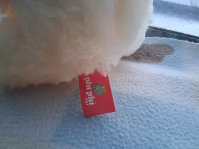 Oso de peluche con corazón - miniatura 3