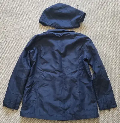 Chaqueta azul con capucha removible - miniatura 1