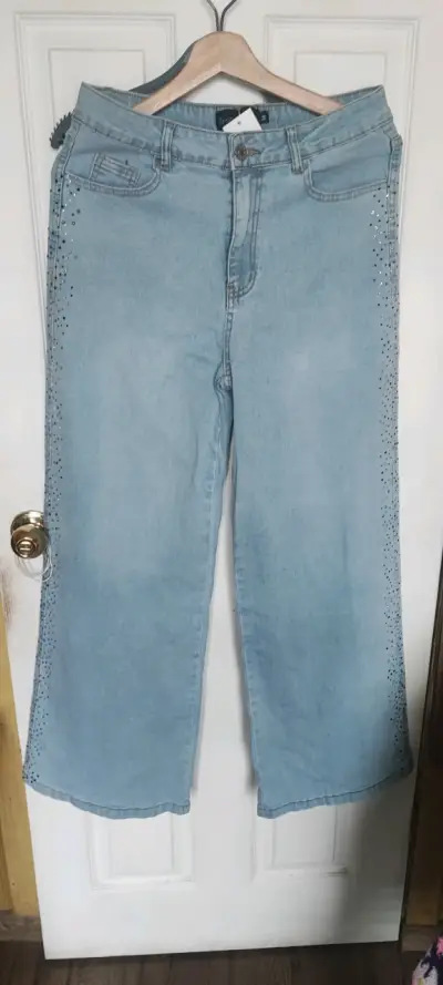 Jeans azul con detalles brillantes elásticado - miniatura 1