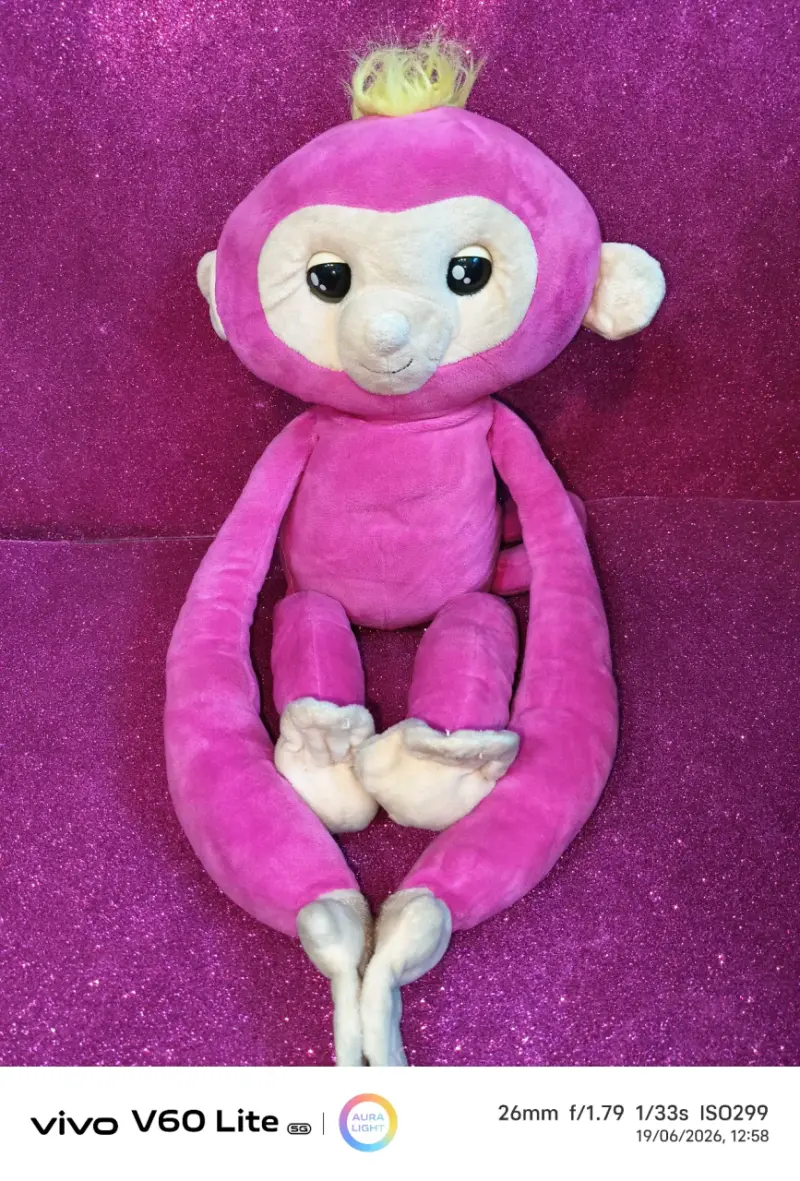 Mono de peluche rosado