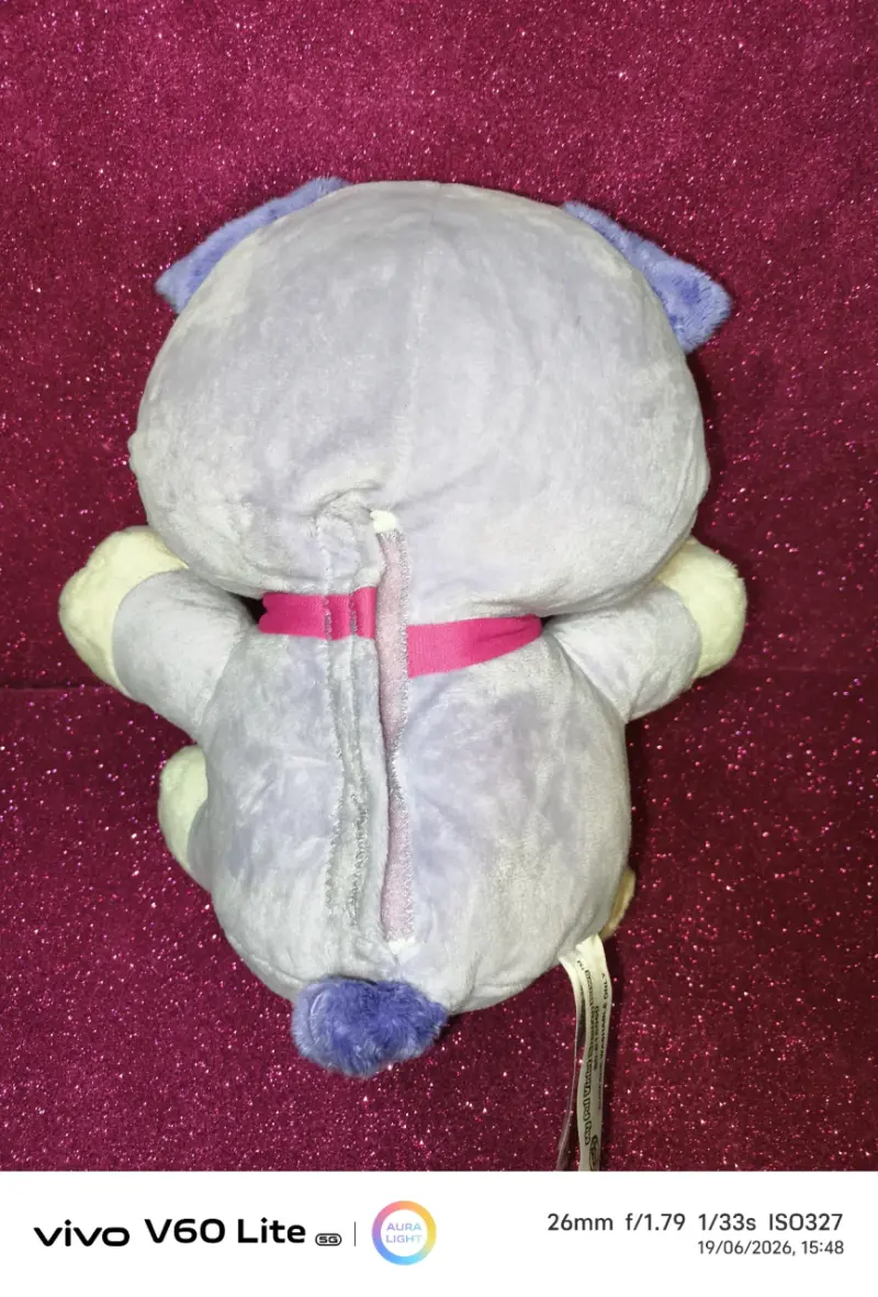 Peluche interactivo morado - 2