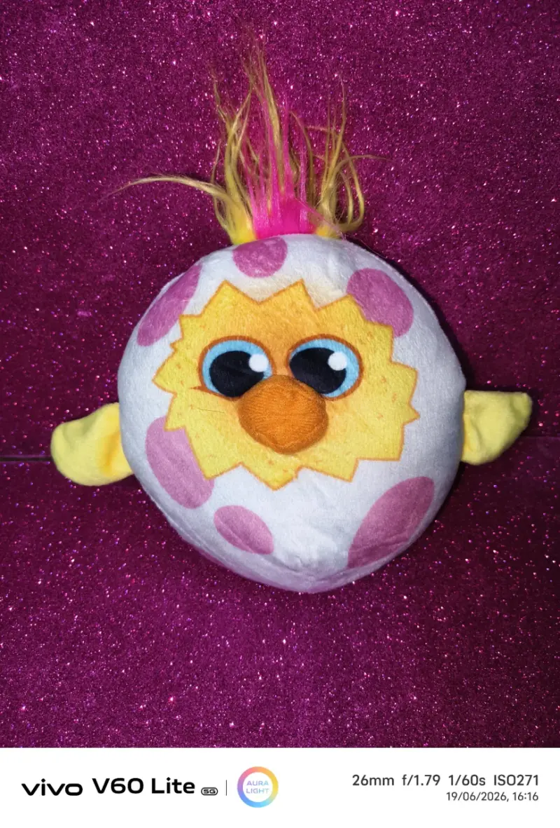 Peluche colorido con diseño divertido - 1