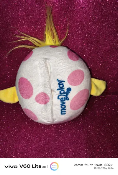 Peluche colorido con diseño divertido - miniatura 2