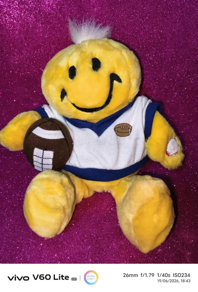 Peluche sonriendo amarillo