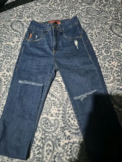 Jeans azules con roturas talla 36 - miniatura 1