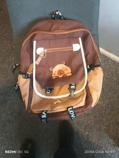 Mochila marrón con diseño de oso - miniatura 1