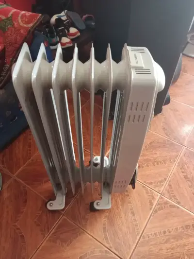 Estufa eléctrica de aceite - miniatura 1