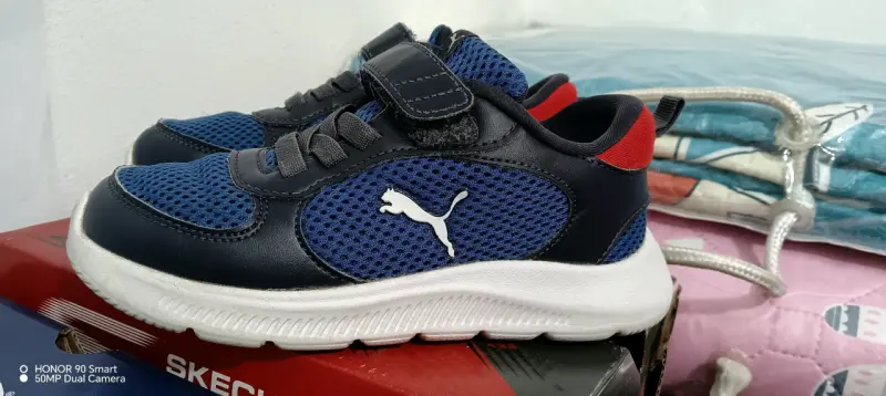 Zapatillas infantiles azules Puma - 1