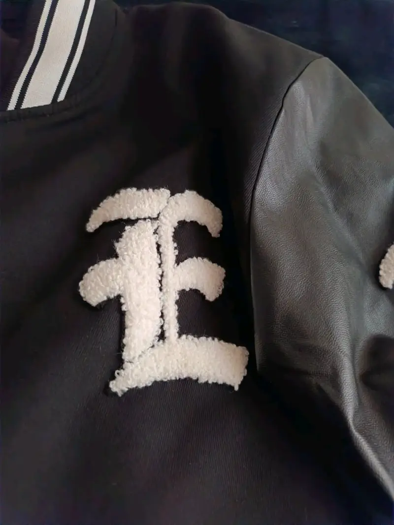 Chaqueta bomber negra con bordados - 2