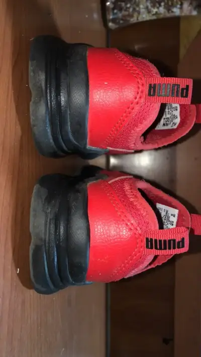 Zapatillas deportivas rojas Puma - miniatura 1
