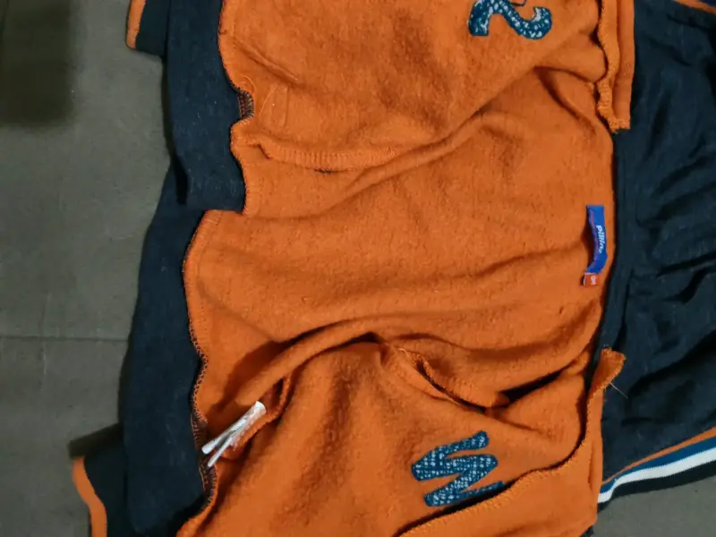 Conjunto de bebé naranjo y azul - 2