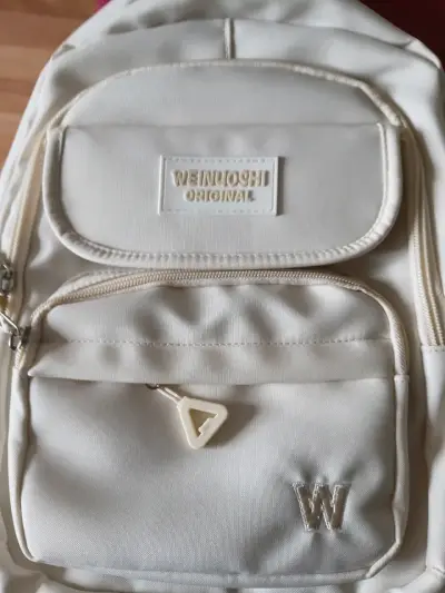 Mochila beige Weinuoshi - miniatura 1
