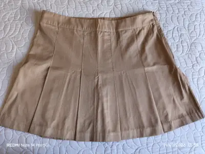 Falda mini beige plisada Marca H&M - miniatura 1