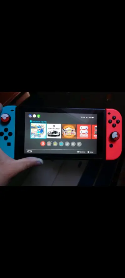 Consola portátil con juegos - miniatura 1